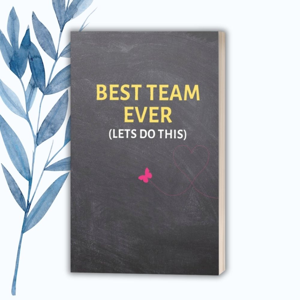 A 6" x 9" notebook with a blackboard-style cover, featuring "Best Team Ever (Let's Do This)" in bold yellow text with a pink butterfly design.