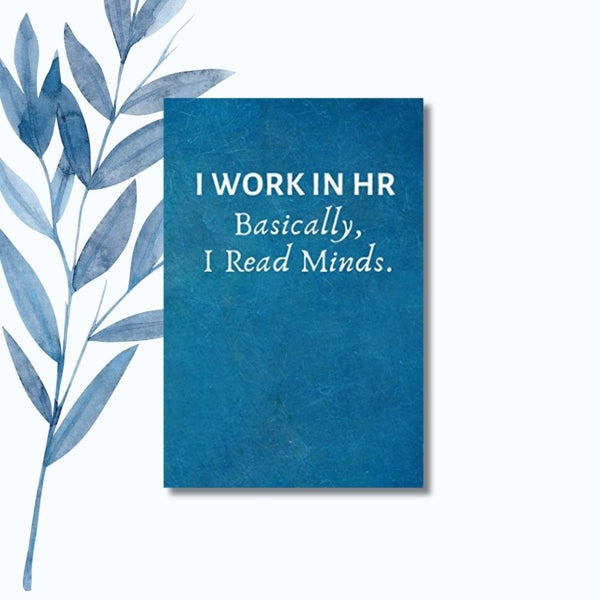 A notebook featuring the phrase "I Work in HR Basically, I Read Minds" on a sleek, glossy cover.