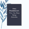 A notebook featuring the phrase "I'm a Pharmacist. Yes, I'm Busy Being Awesome" on a sleek, glossy cover. Funny Humorous and bold notebook design, ideal for pharmacists or pharmacy professionals.