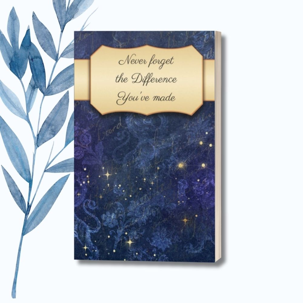 A notebook featuring the phrase "Never Forget the Difference You’ve Made" on a sleek, glossy cover.