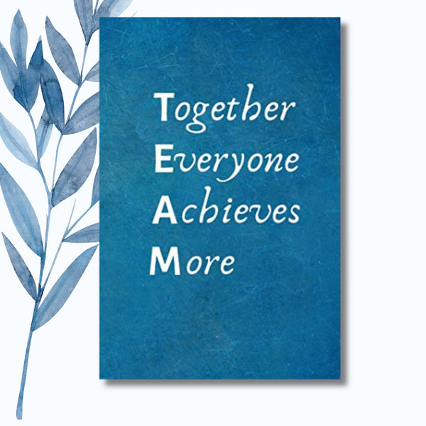 A notebook featuring the phrase "Together Everyone Achieves More" on a sleek, glossy cover.